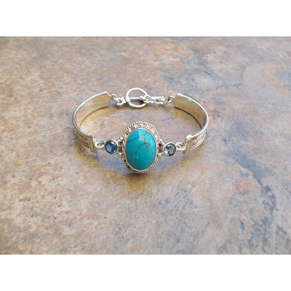 REVE Large Oval Turquoise Hinged Sterling Silver and 14kt Bracelet with Blue Topaz - ICE